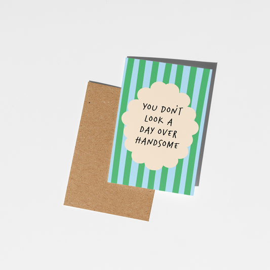Greeting card with text and striped design on a white background