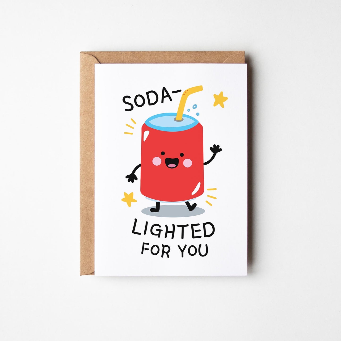 Greeting card with a cartoon soda character and text on a white background