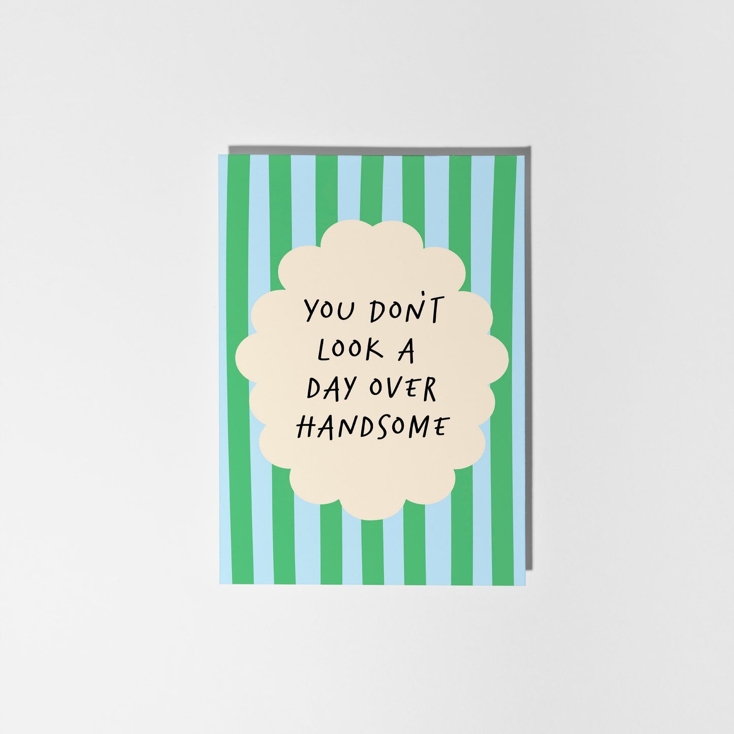 Card with striped design and text on a white background