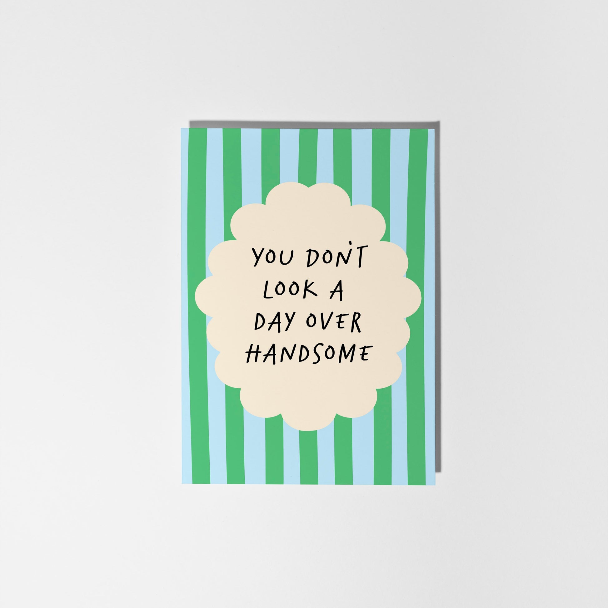 Card with striped design and text on a white background