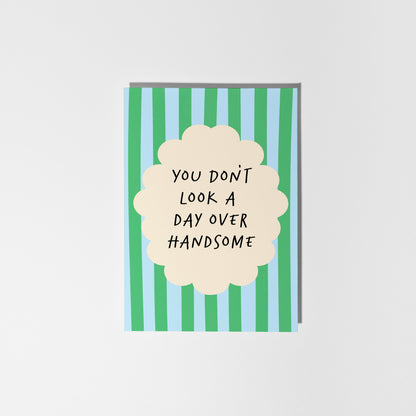 Card with striped design and text on a white background