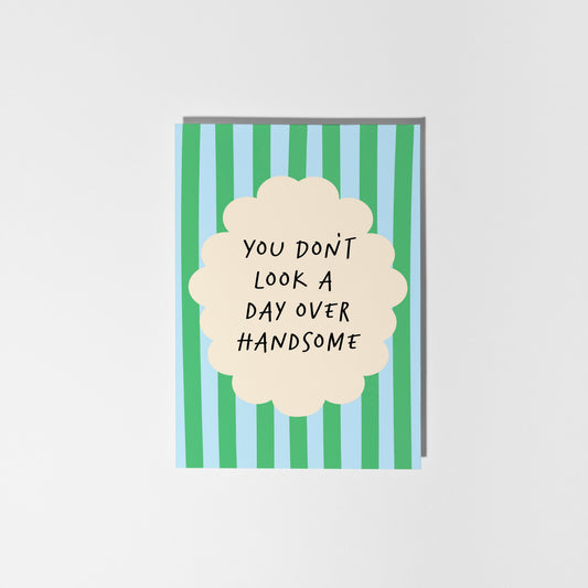 Card with striped design and text on a white background