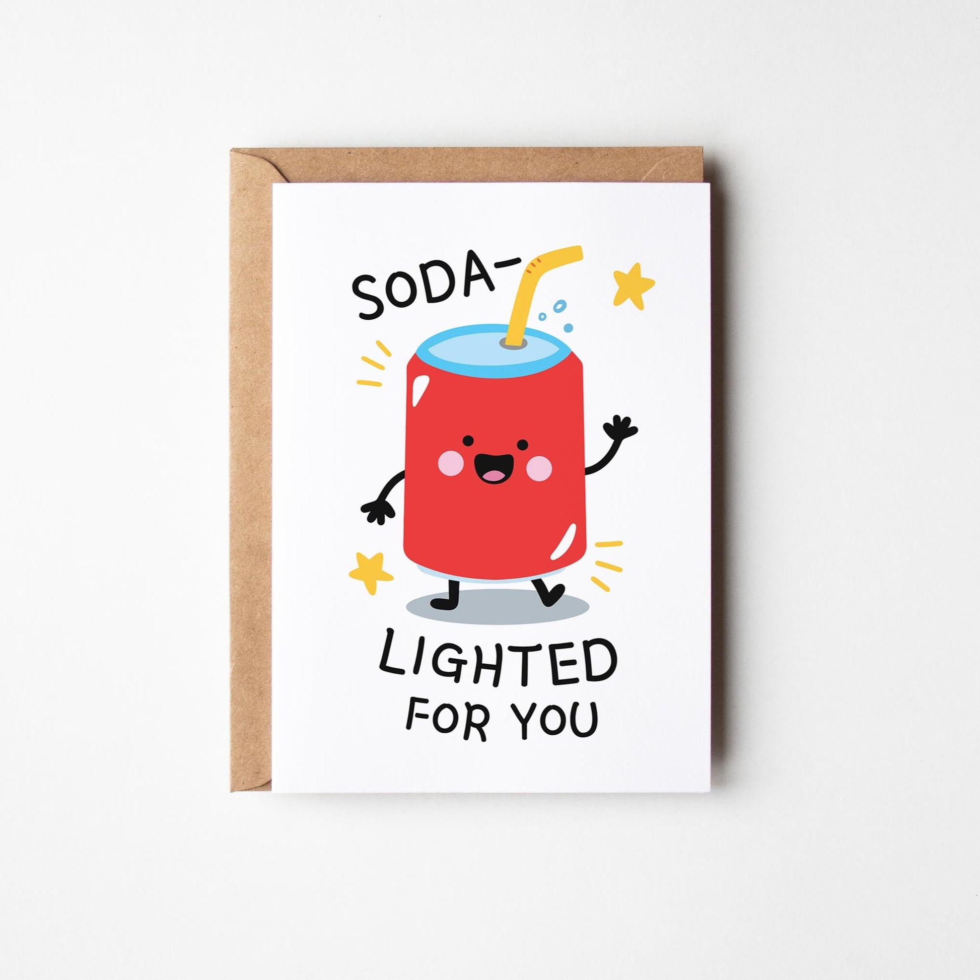 Greeting card with a cartoon soda character and text on a white background