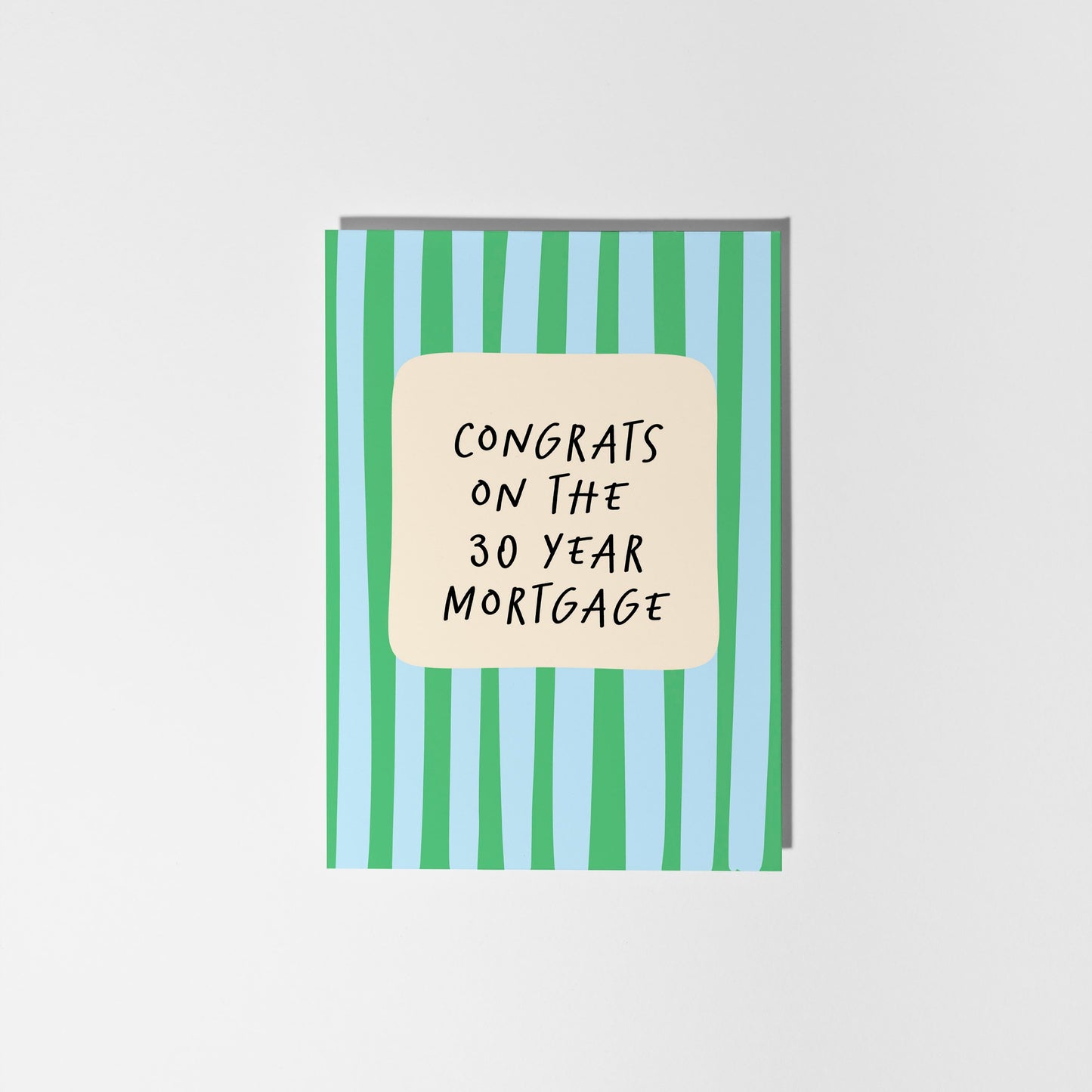 Card with green and blue striped design and 'Congrats on the 30 year mortgage' text on a white background