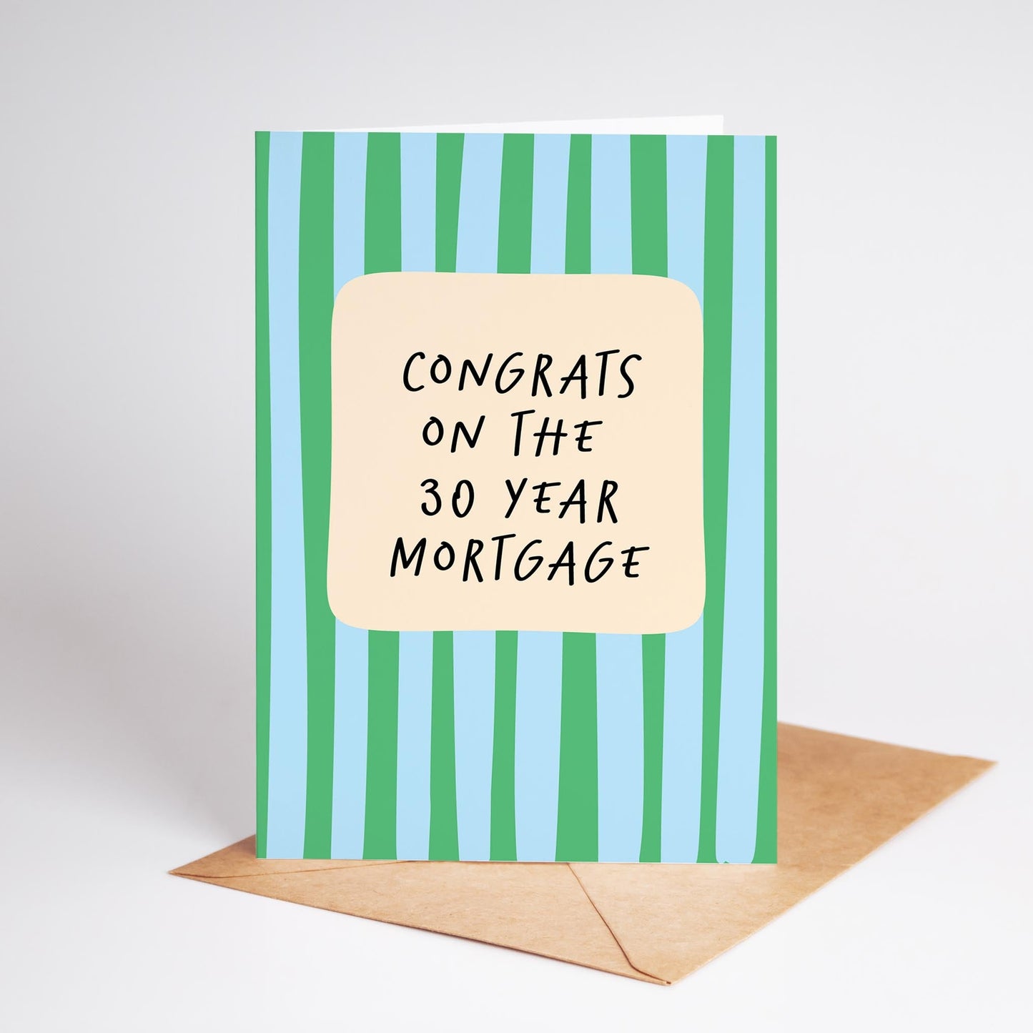 Card with green and blue striped design and text 'Congrats on the 30 year mortgage' on a white background