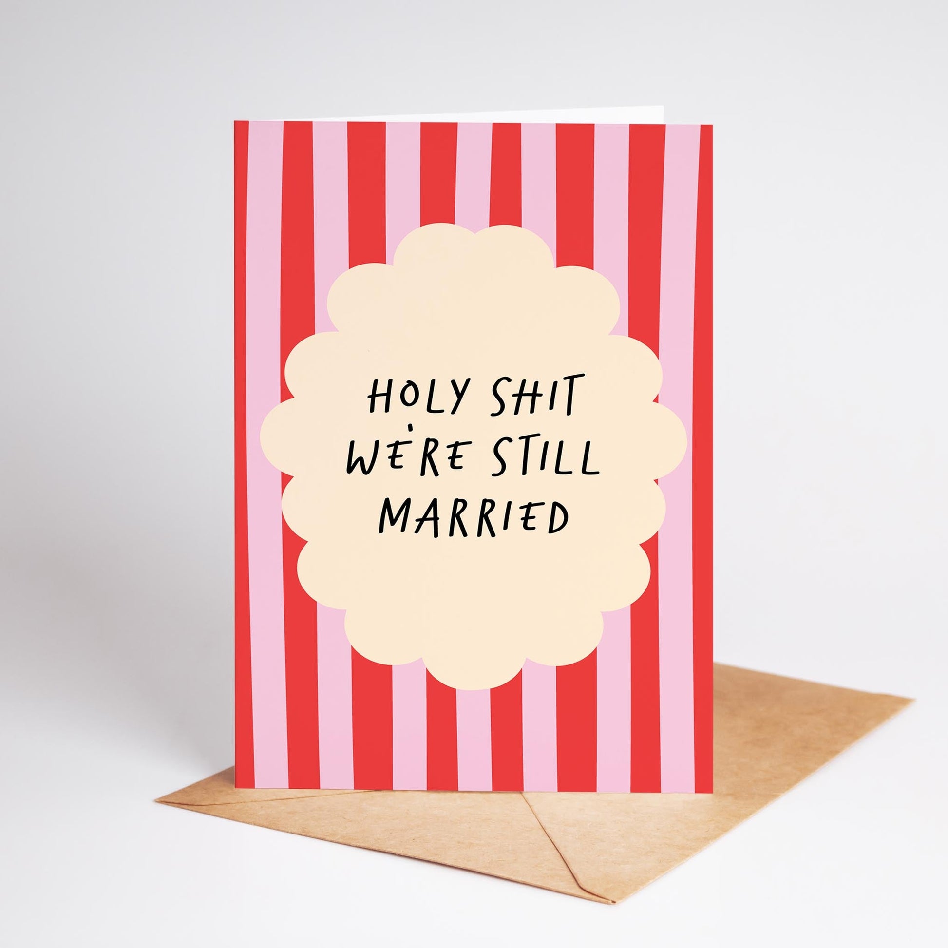 Card with red and white striped design and humorous text on a plain background