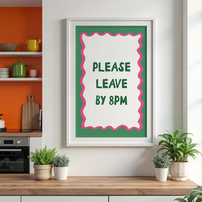 Framed poster with 'Please Leave by 8PM' text in a kitchen setting